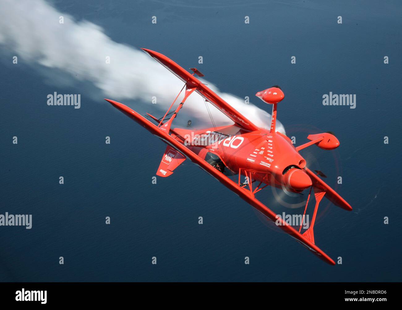 Sean D. Tucker, of Team Oracle, files his Challenger II biplane upside ...
