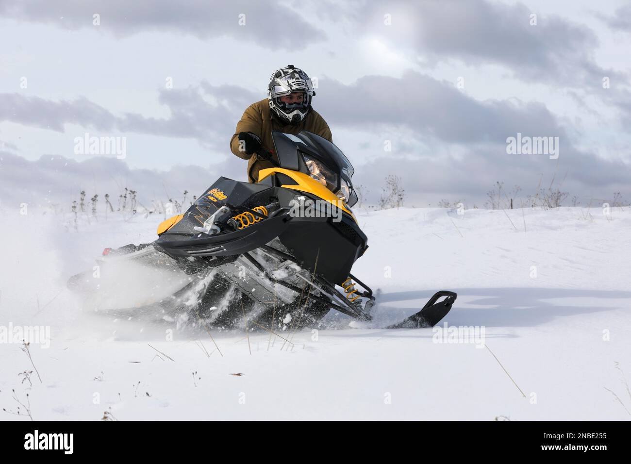 LITTLE FALLS, Minn. (Feb. 9, 2023) –A U.S. Navy Explosive Ordnance Disposal (EOD) Technician, assigned to EOD Mobile Unit Two, drives a snowmobile during Arctic mobility training in Little Falls, Minnesota, Feb. 9, 2023 during Snow Crab Exercise 23-1, an exercise designed to test and evaluate U.S. Navy Explosive Ordnance Disposal’s (EOD) and Navy Diver’s capabilities and equipment in a simulated Arctic environment and improve combat effectiveness. Navy EOD and Navy Divers are part of the Navy Expeditionary Combat Force (NECF), enabling the U.S. Navy Fleet by clearing and protecting the battles Stock Photo