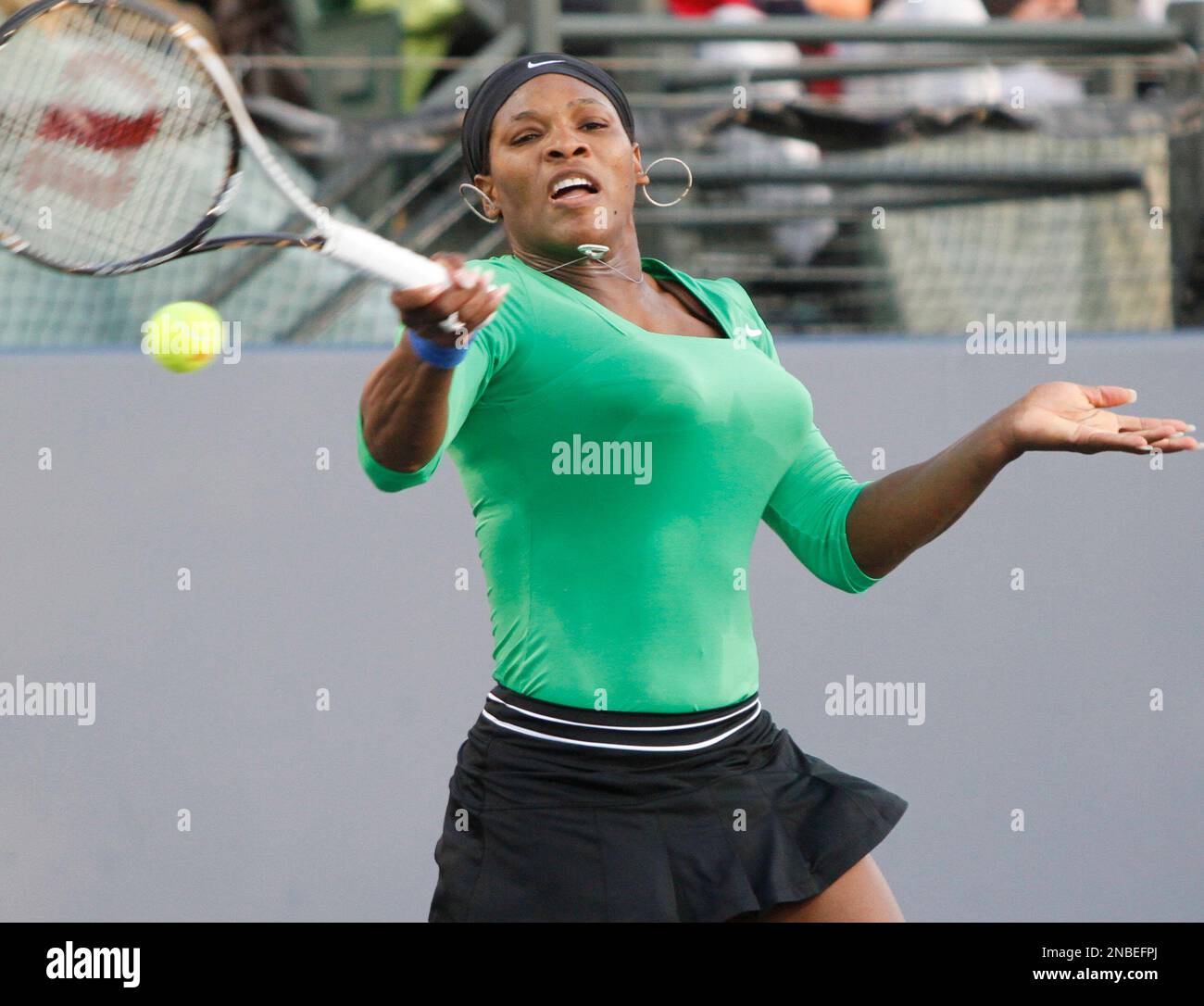 Serena Williams hits a forehand against Sabine Lisicki, of Germany, during  the Bank of the West tennis tournament, Saturday, July 30, 2011, in  Stanford, Calif. Williams beat Lisicki in the semifinal match