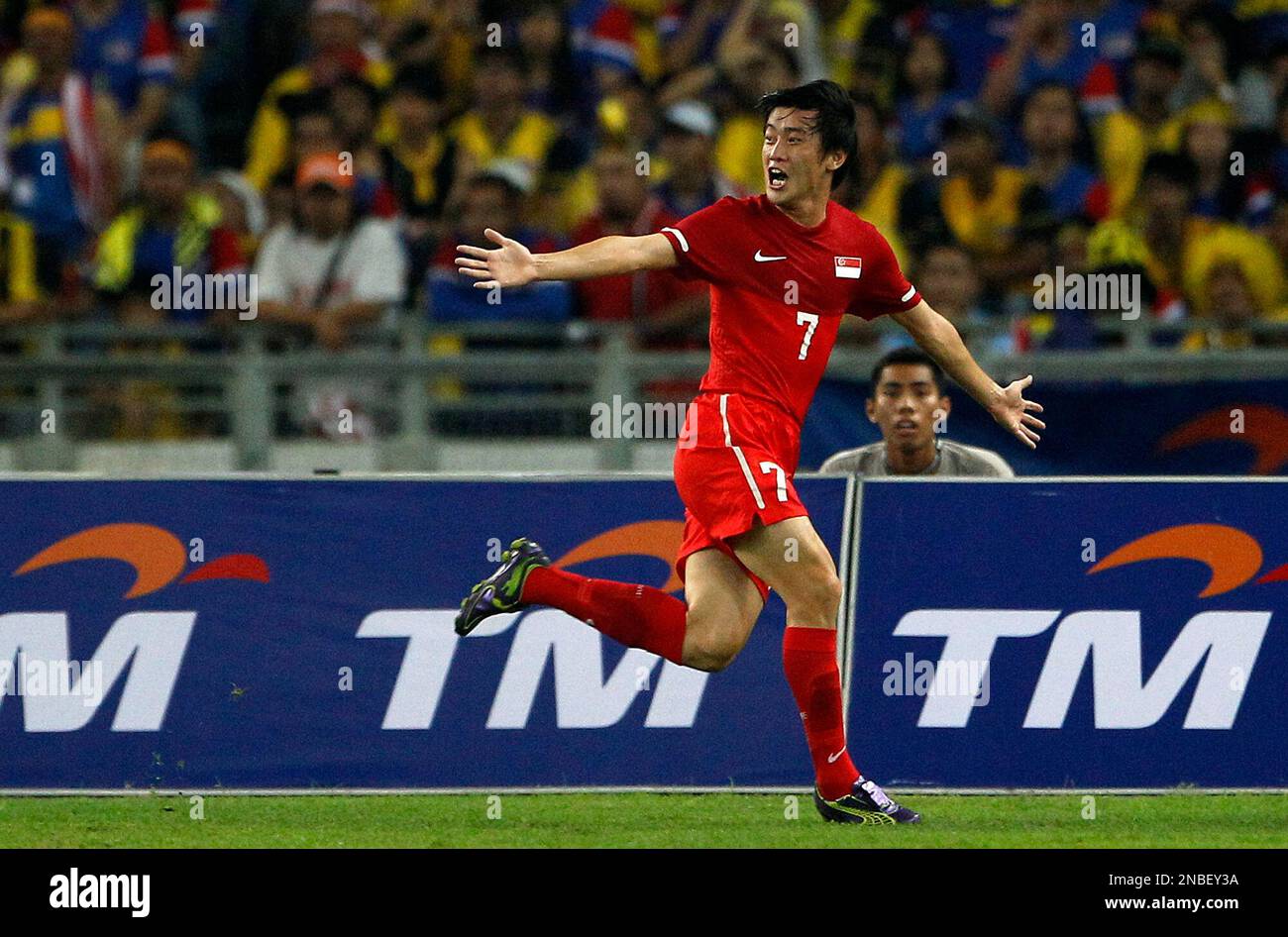 Singapore's Shi Jiayi celebrates after scoring the team's first goal ...