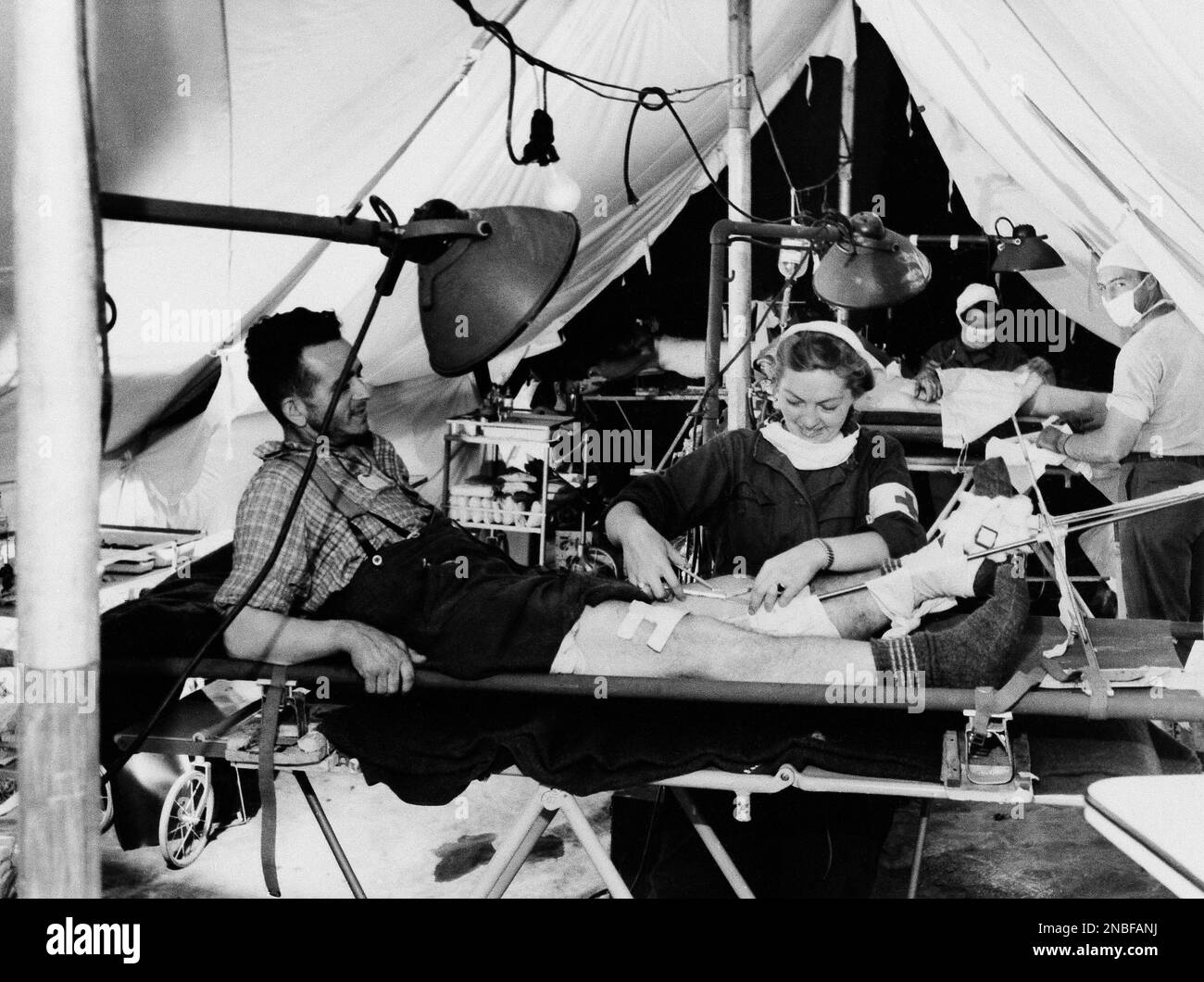 Lieutenant Mildred Macdonald of Collingswood, New Jersey, dresses the