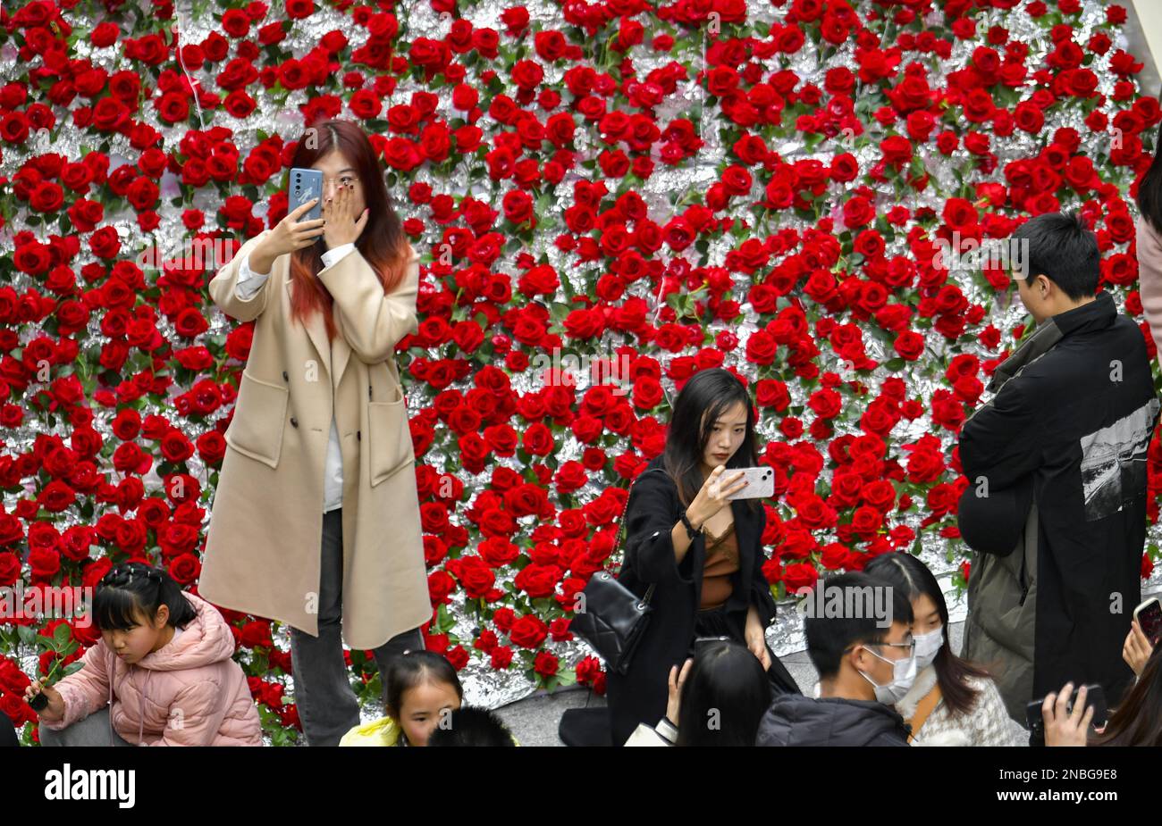 Stairs covered with 10,000 roses attract people to take photos in a ...