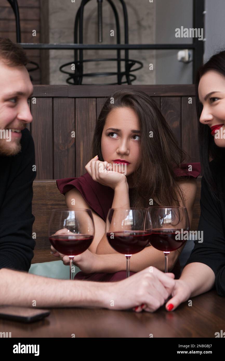 Love triangle. Female jealousy for relationship Stock Photo Alamy