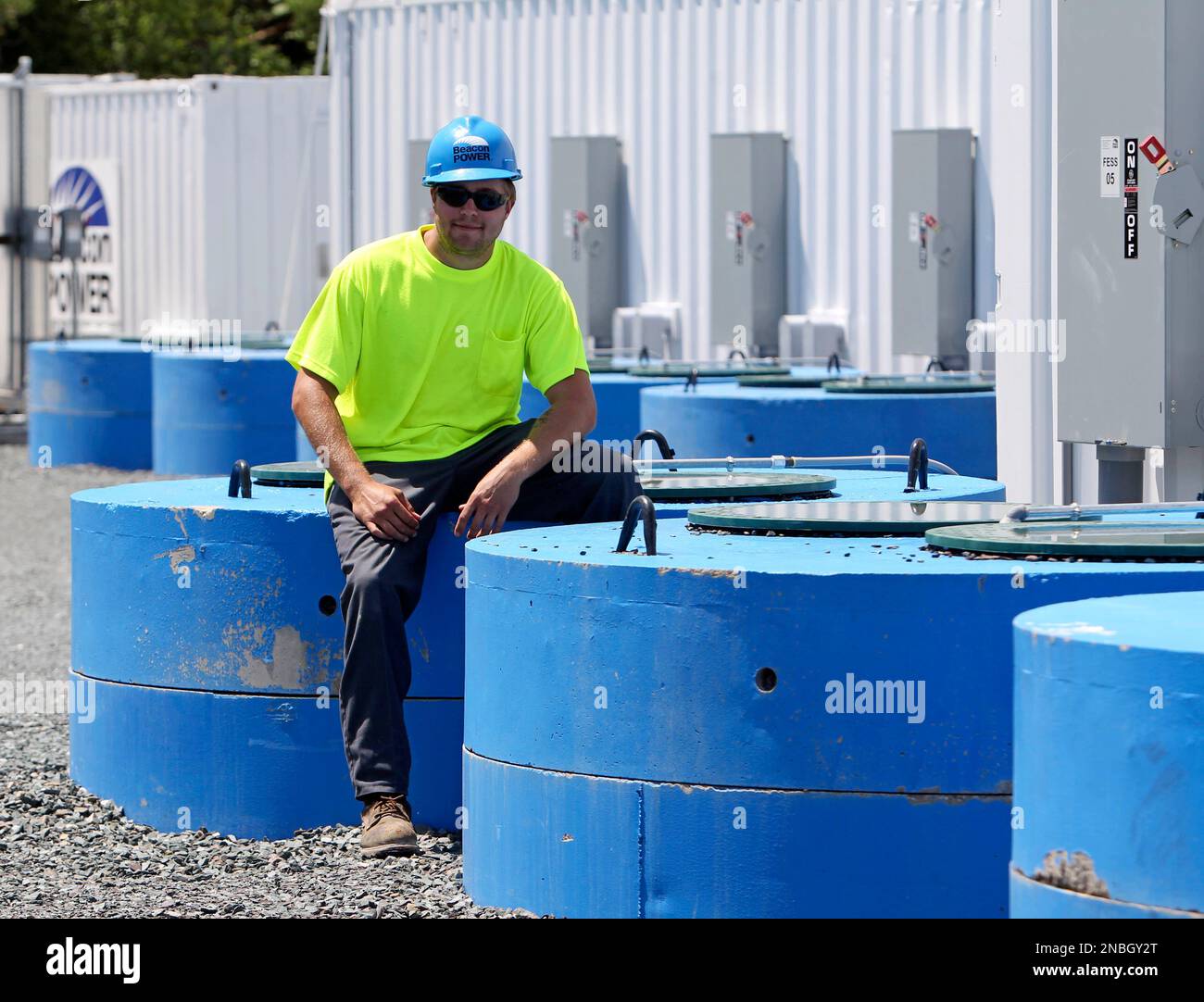 Nathan Cowen poses atop flywheel battery pits at Beacon Power in