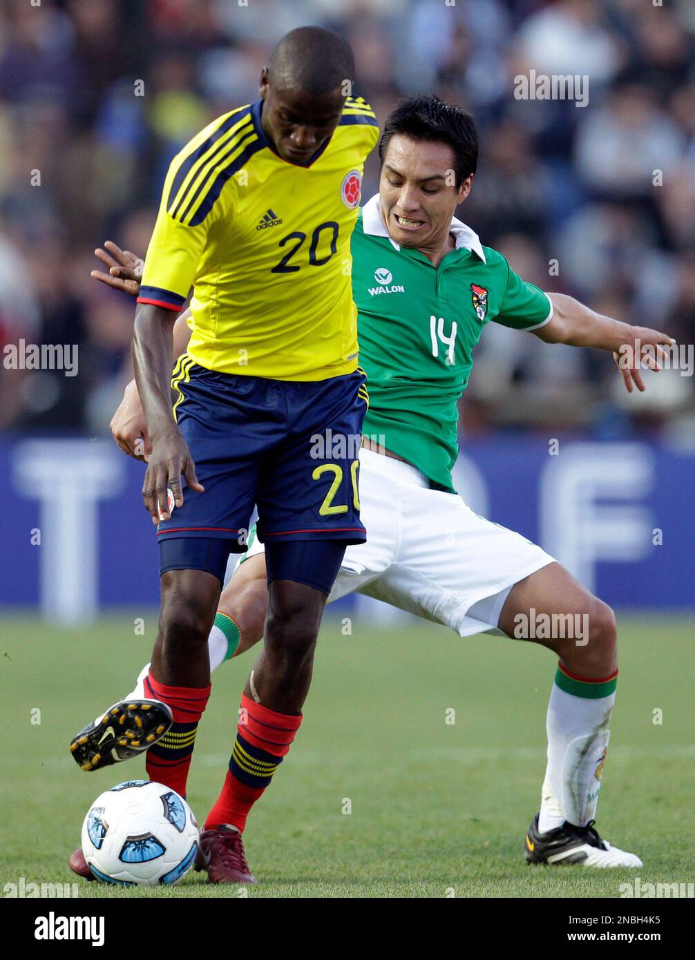Colombia's Adrian Ramos, front, and Bolivia's Christian Vargas compete ...