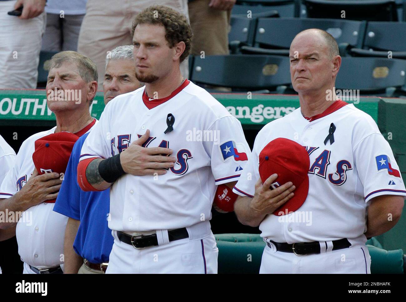 Texas Rangers' Jackie Moore, from left, athletic trainer Jamie