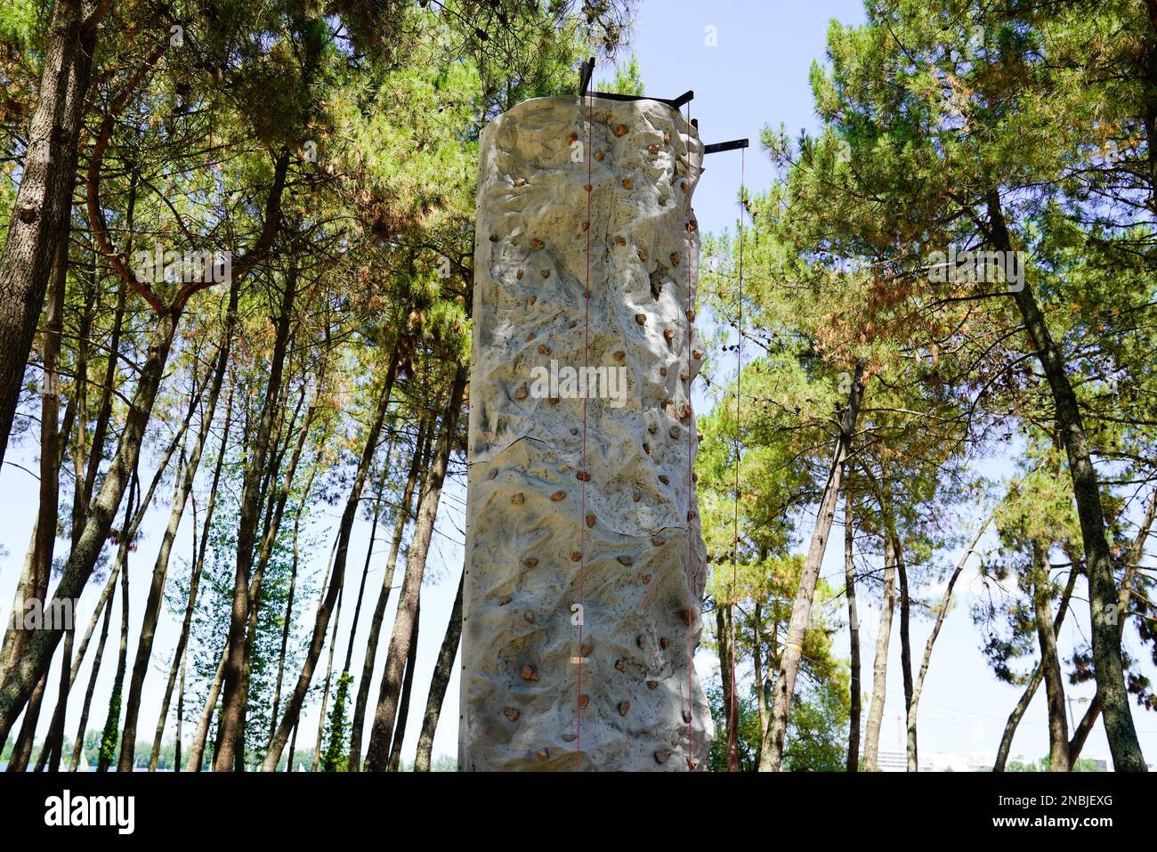 artificial plastic Rock Climbing Outdoors on factitious wall Stock