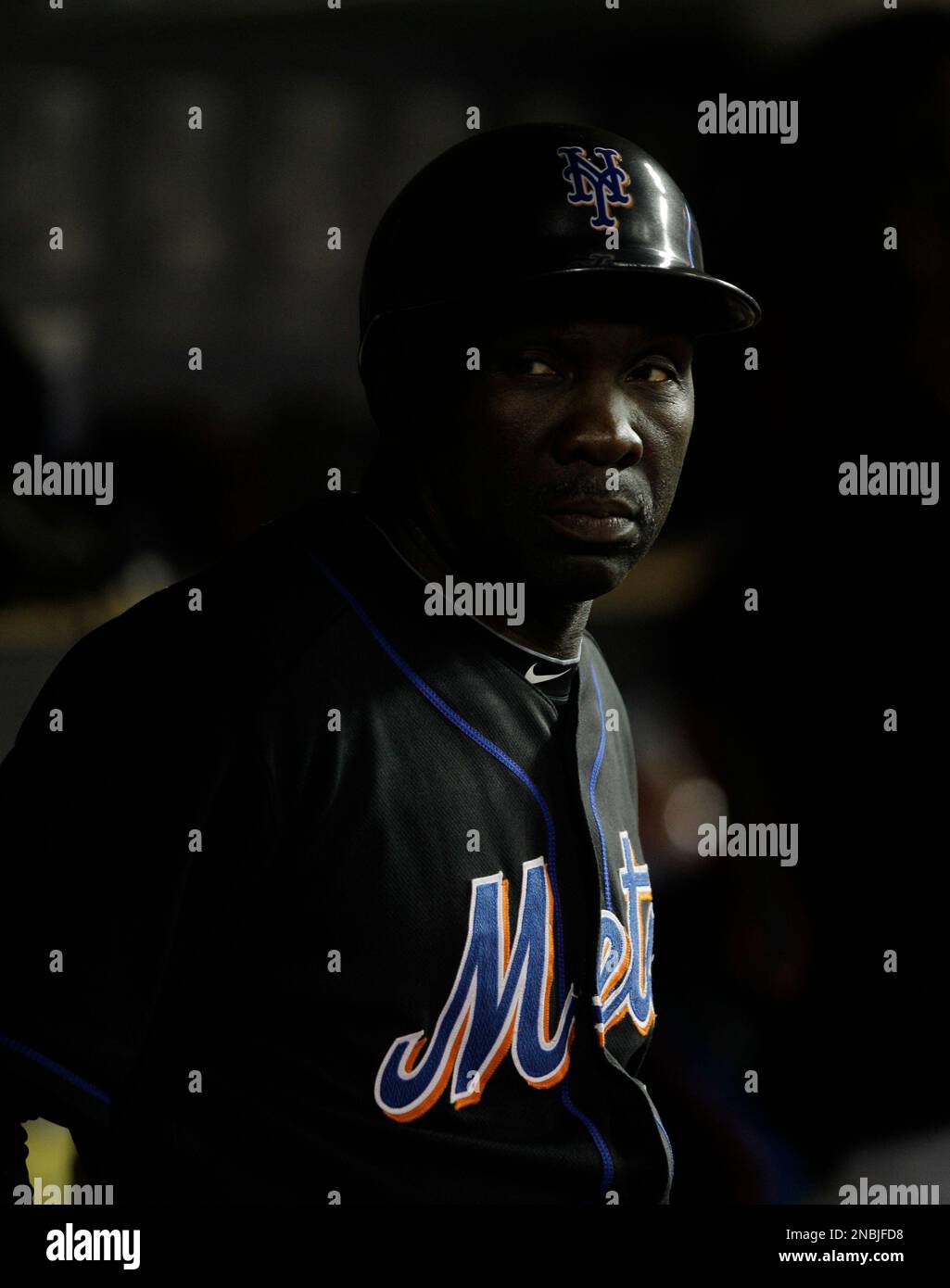 New York Mets first base coach Mookie Wilson watches against the