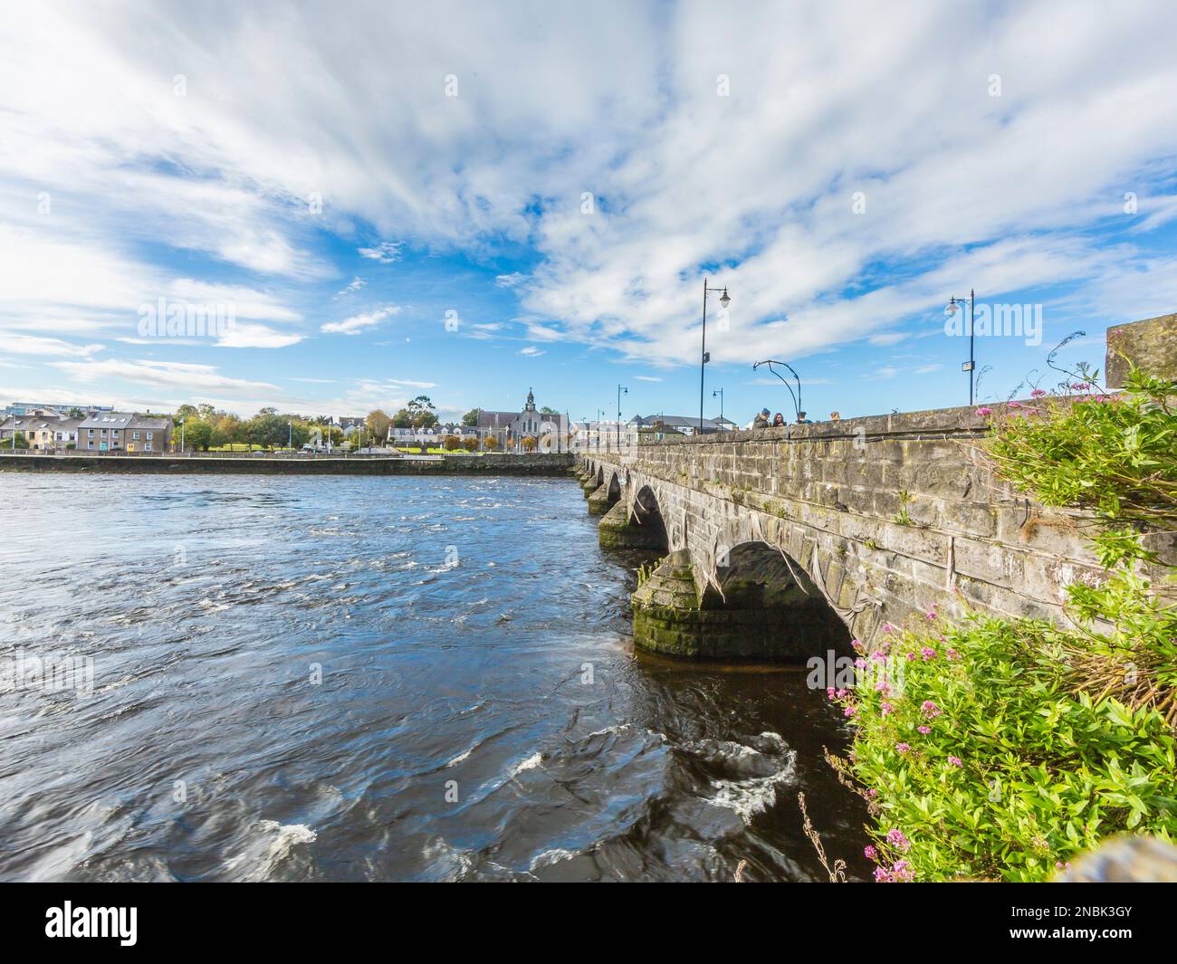 Thomond bridge in Limerick with river Shannon during daytime Stock Photo