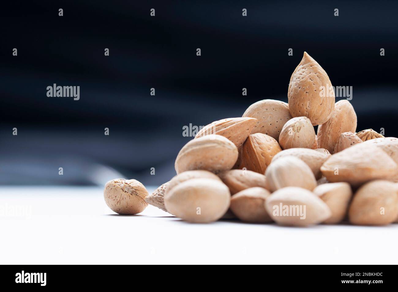 Almonds with shell , Prunus amygdalus, Satara, Maharastra, India Stock Photo