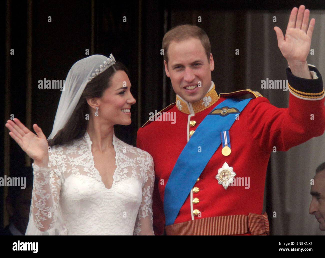 FILE -- Britain's Prince William, right, and Kate, Duchess of Cambridge wave from the balcony of Buckingham Palace after their wedding service at Westminster Abbey in London, in this Friday, April, 29, 2011 file photo. The programme of their first overseas trip, released in London, Tuesday June 21, 2011, sounds almost like a second honeymoon: barbecues, canoe trips, a full-day of down time free of official duties, and a chance to see the length and breadth of Canada at its full summer glory. They will see much of Canada on an eight-day voyage to celebrate Commonwealth ties, then zip in to Los  Stock Photo