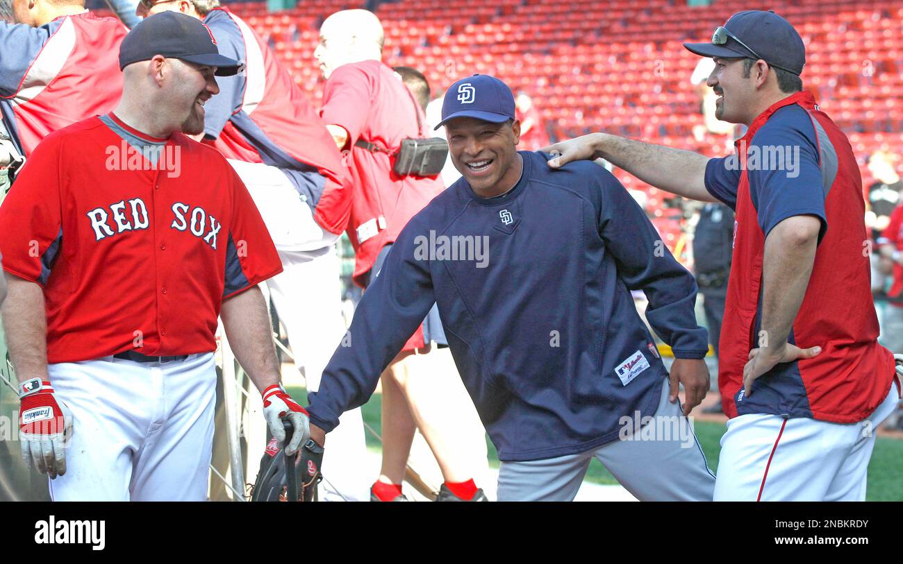 Boston Red Sox first baseman Kevin Youkilis jokes with Royals