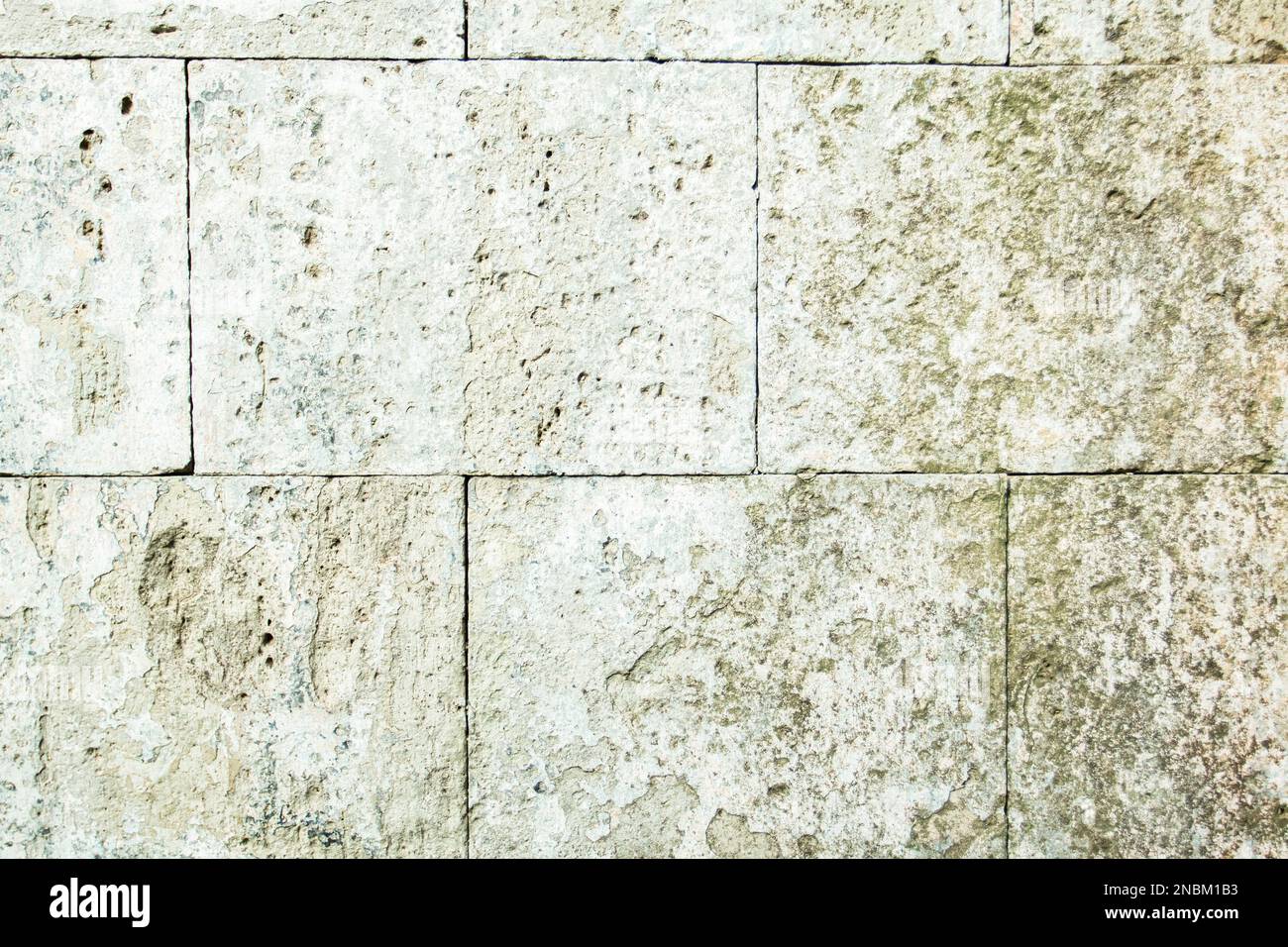 section of the fortress wall made of old travertine blocks Stock Photo