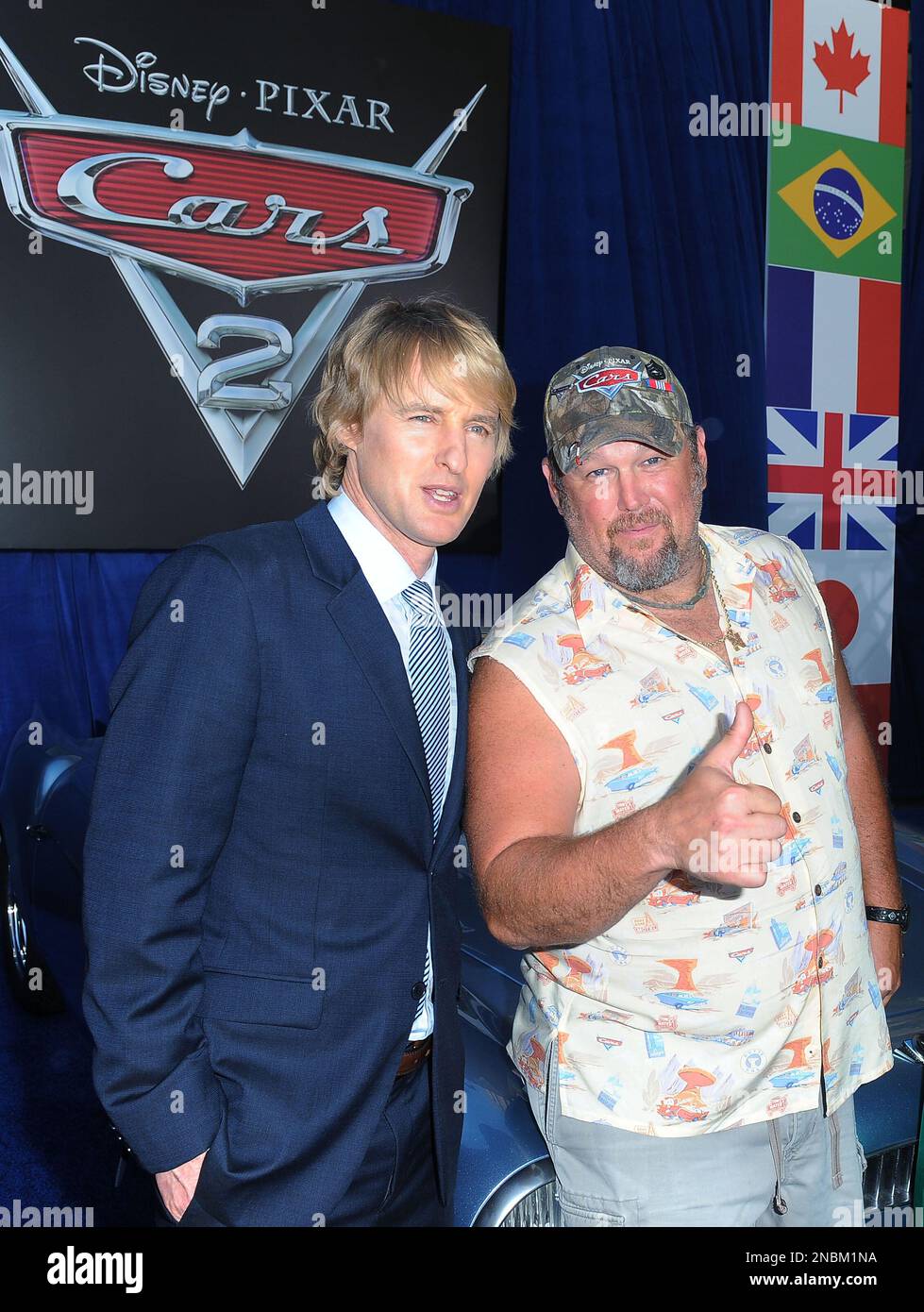 Owen Wilson, at left, and Larry The Cable Guy arrive at the world premiere of "Cars 2" at El