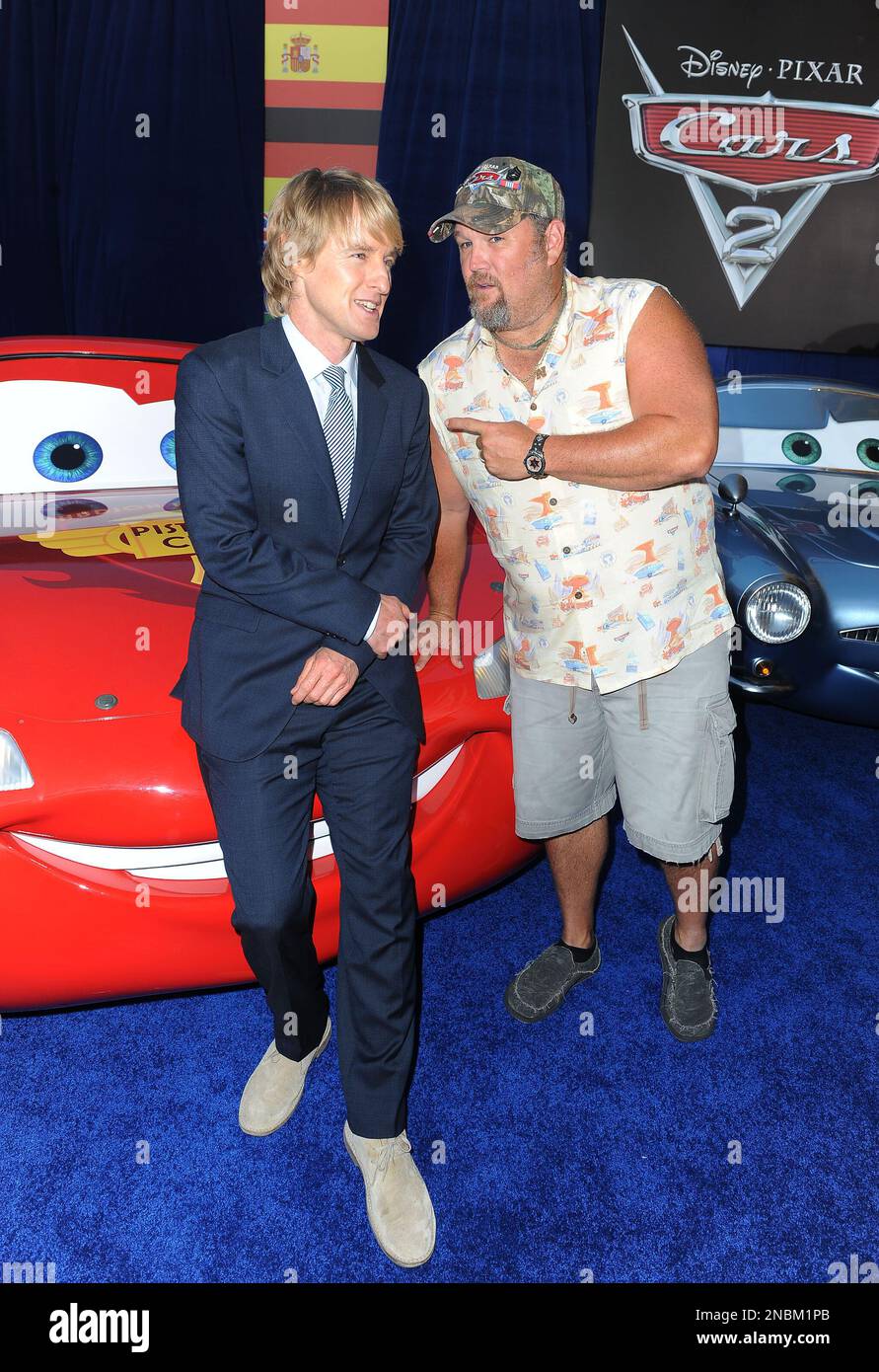Owen Wilson, at left, and Larry The Cable Guy arrives at the world