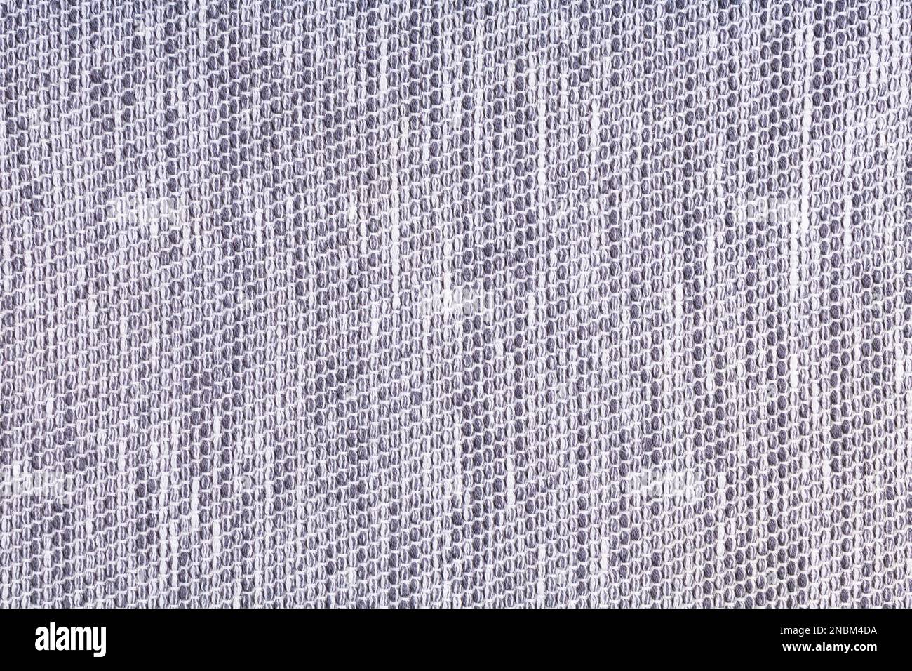 abstract background of soft textured fabric in gray and white checkered Stock Photo