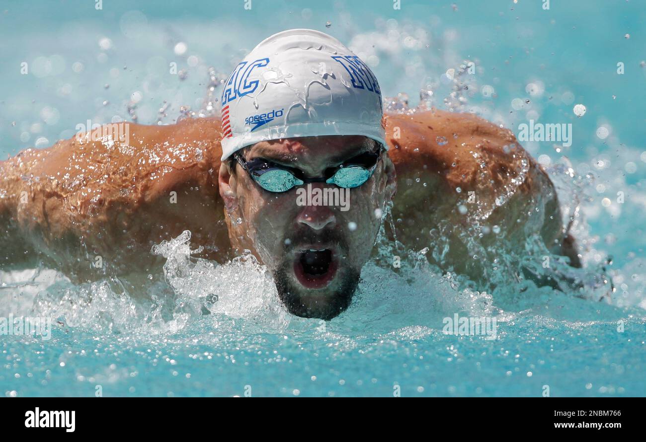 World record holder Michael Phelps races in the 100-meter