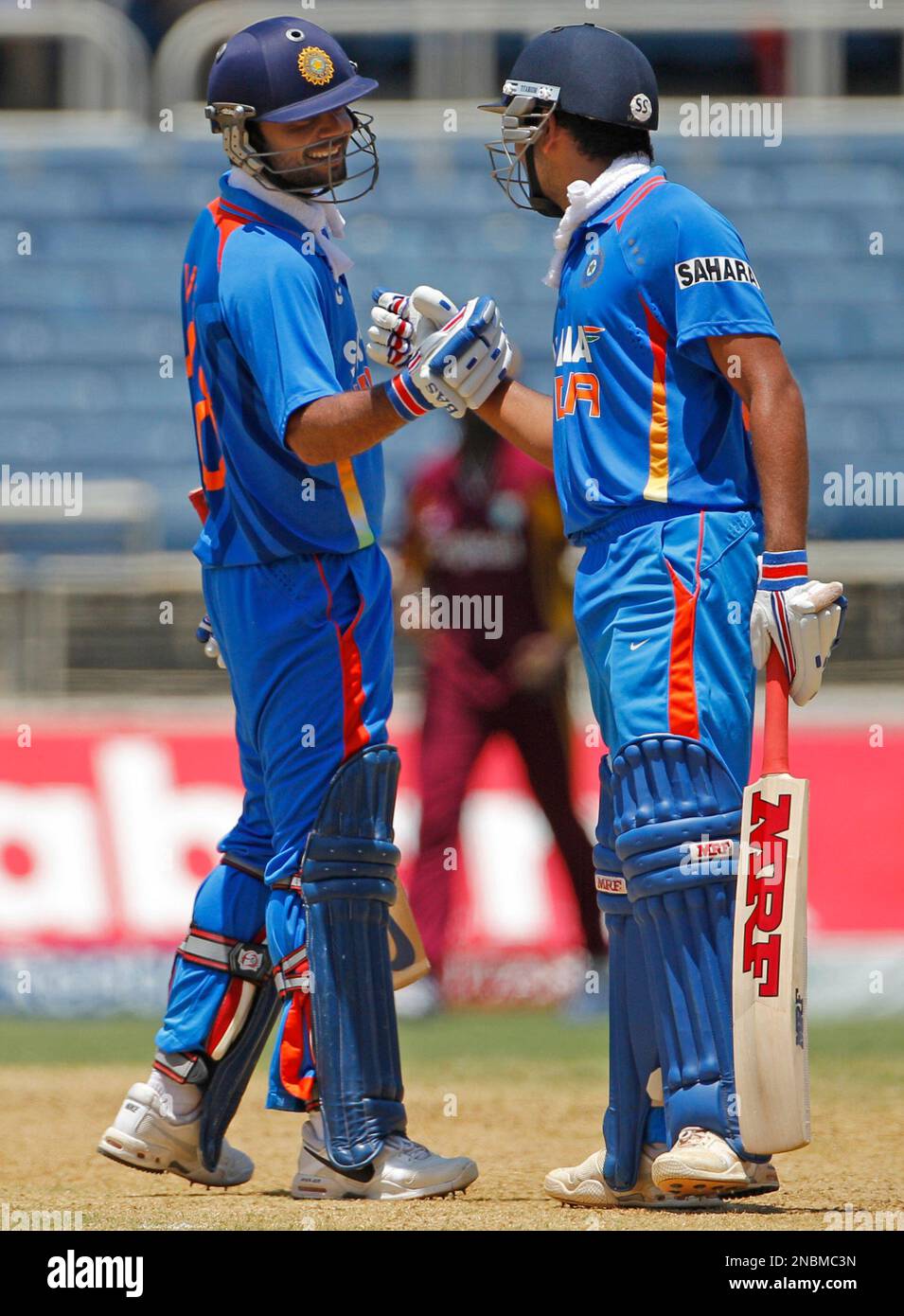 India's Virat Kohli, Left, Congratulates Is Batting Partner Rohit ...