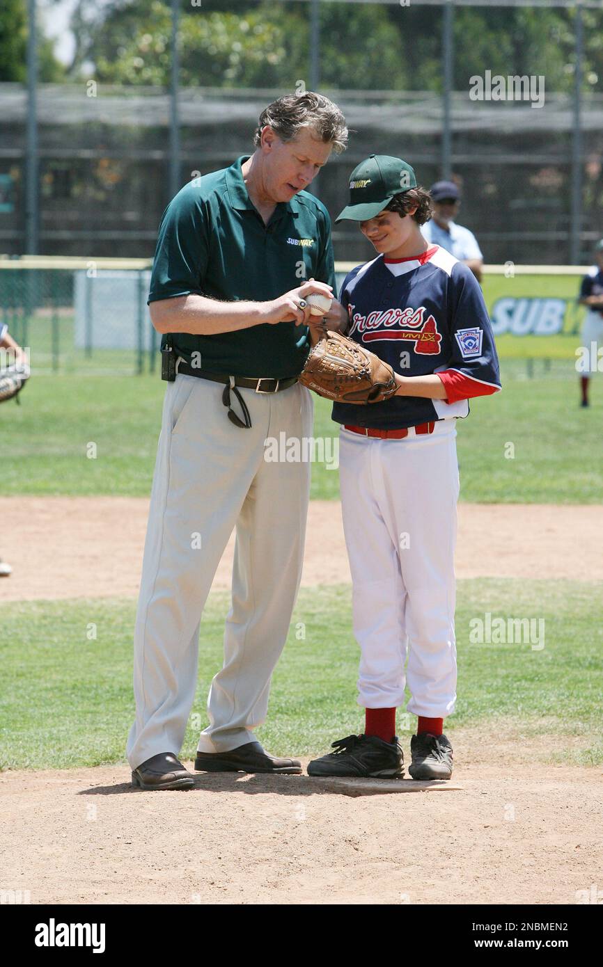 Orel Hershiser and an Encino Little Leaguer are seen at the SUBWAY National  Little League Appreciation Game on Wednesday, June 15, 2011, in Los  Angeles, California. The game launched the SUBWAY Baseball