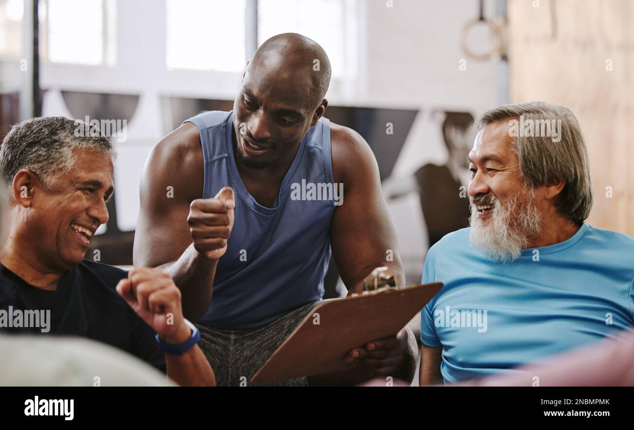 Gym, membership and personal trainer with men for sign up, planning and