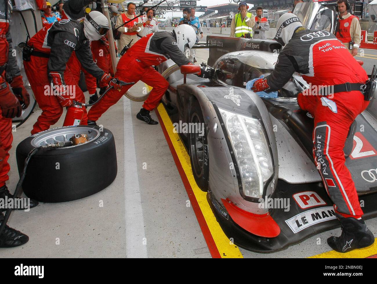 June 12, 2011 - Le Mans, France - OAK Racing mechanics sleep in the early  morning hours during the 24 Hours of Le Mans auto race. (Credit Image: ©  Rainer Erhardt/ZUMAPRESS.com Stock Photo - Alamy