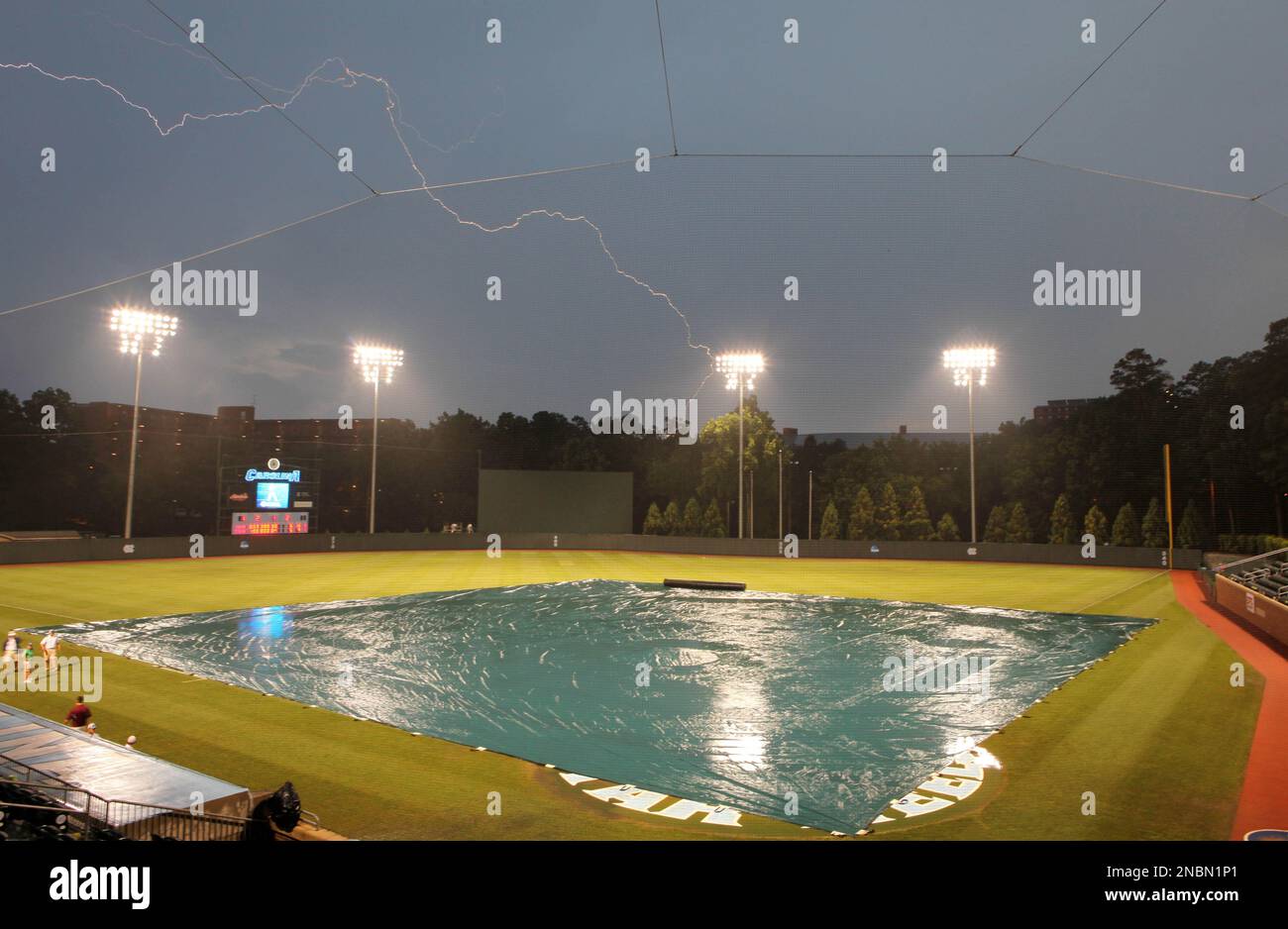 Rain and lightning in the ninth inning delays the baseball game between ...