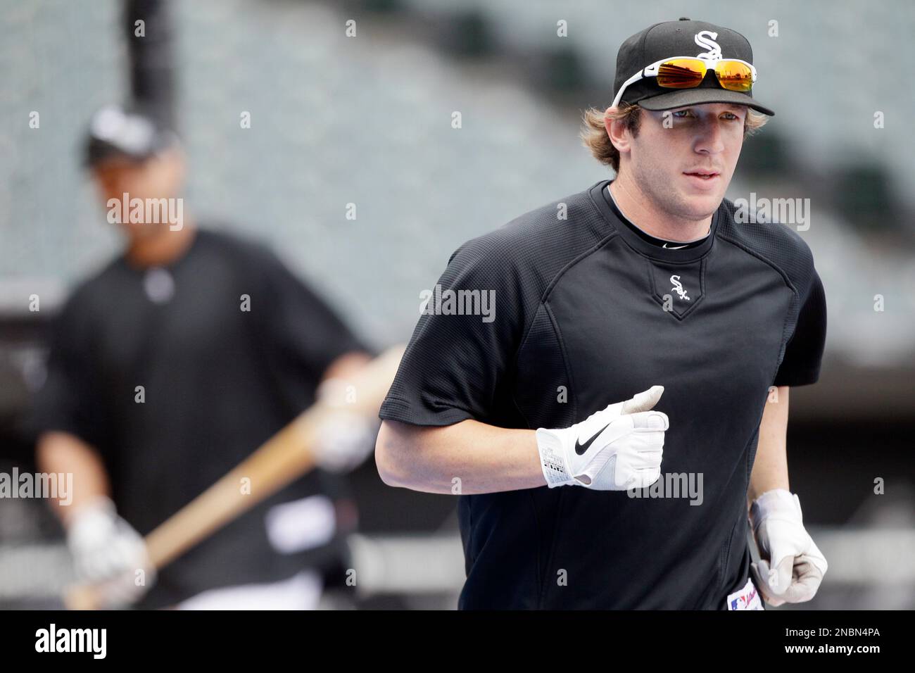 Chicago White Sox's Brent Morel runs on the field before a baseball game between the Oakland
