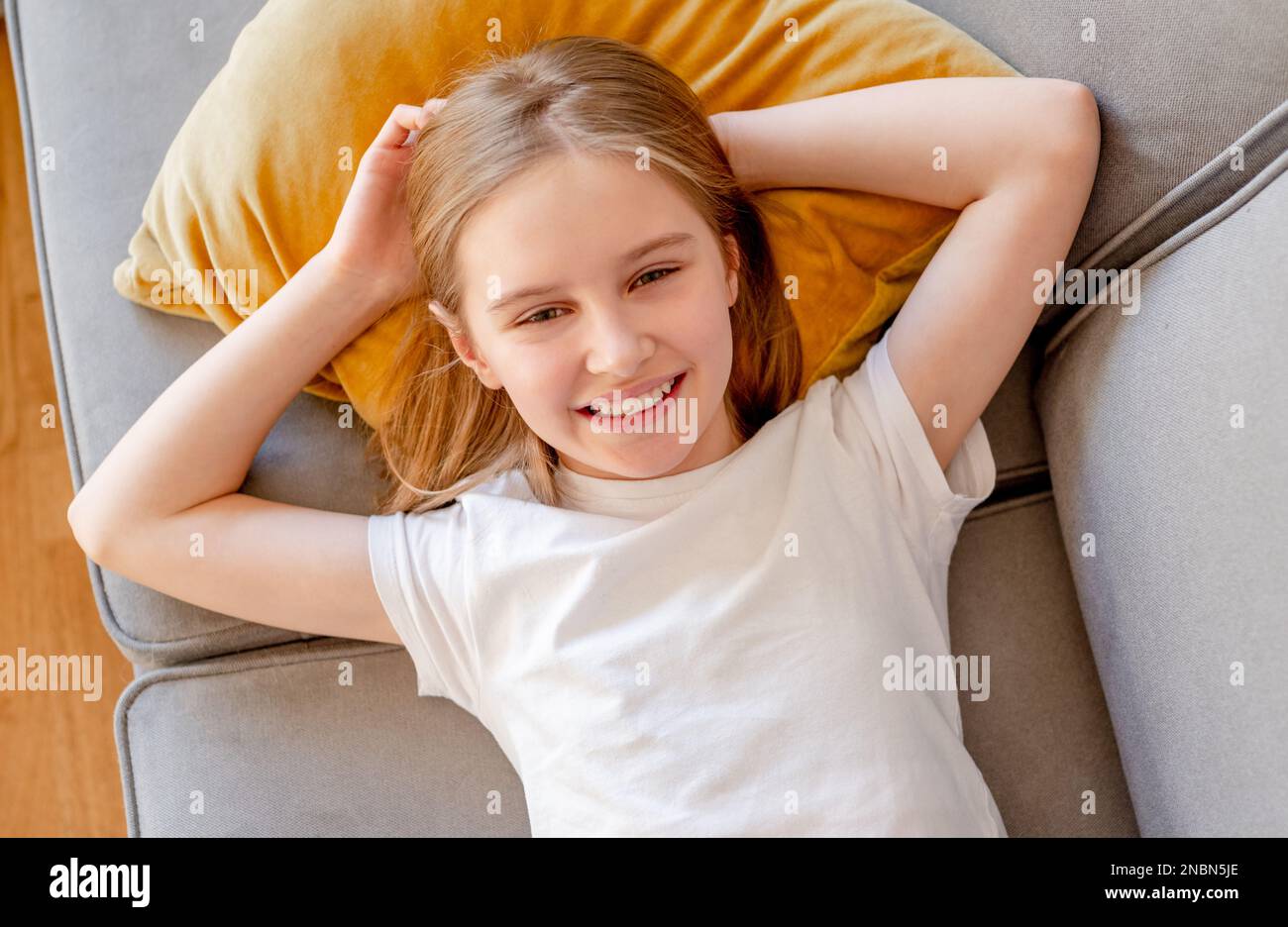 Preteen girl posing into room hi-res stock photography and images - Alamy