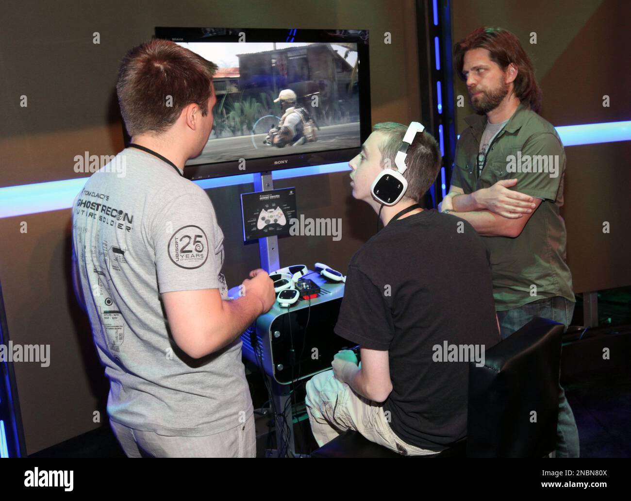 Make A Wish guest Thomas Williams, center, plays Tom Clancy's Ghost