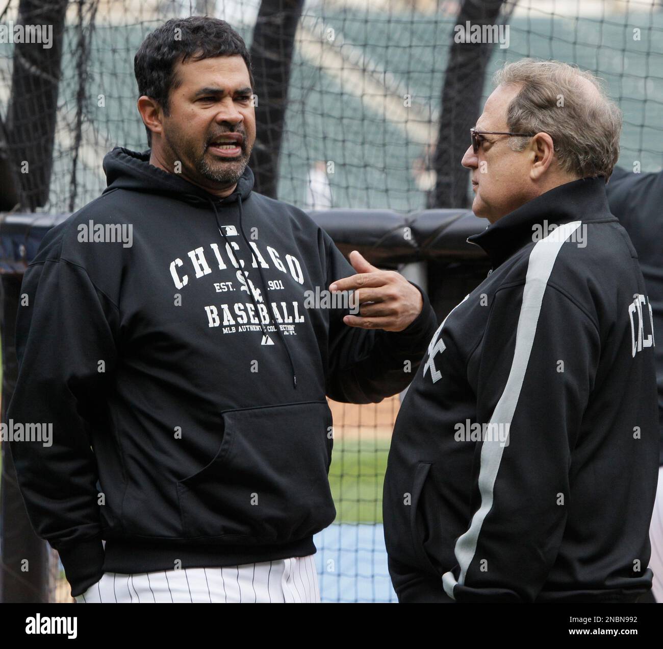 Chicago White Sox manager Ozzie Guillen, left, gets his 2005 World Series  Championship ring from chairman Jerry Reinsdorf before the game against the  Cleveland Indians on April 4, 2006, in Chicago. (UPI