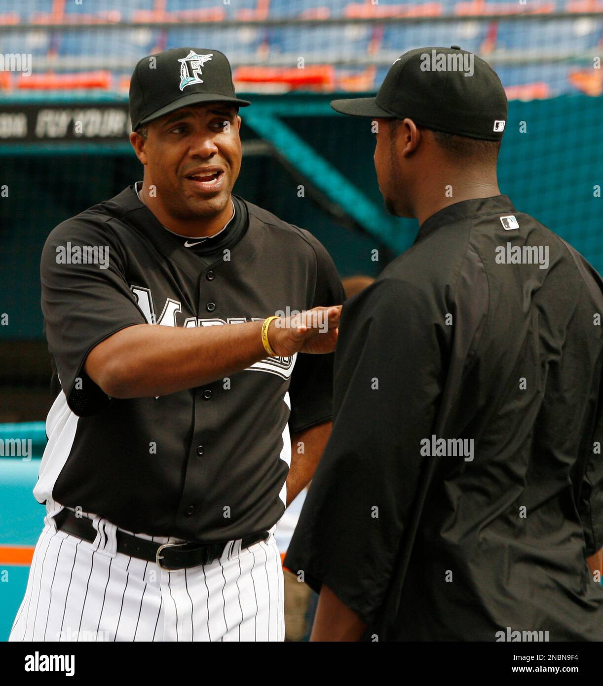 June 28, 2011; Oakland, CA, USA; Florida Marlins batting coach Eduardo  Perez (30) stands in the dugout before the game against the Oakland  Athletics at the O.co Coliseum. Oakland defeated Florida 1-0