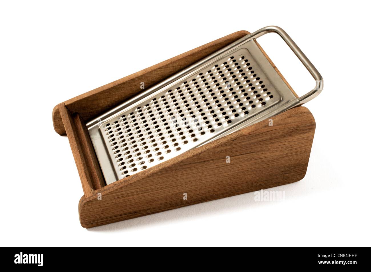 https://c8.alamy.com/comp/2NBNHH9/cheese-grater-food-classic-wooden-and-metal-kitchen-on-white-backgroundvintage-kitchen-utensil-on-white-isolated-copyspaceshredder-overview-2NBNHH9.jpg