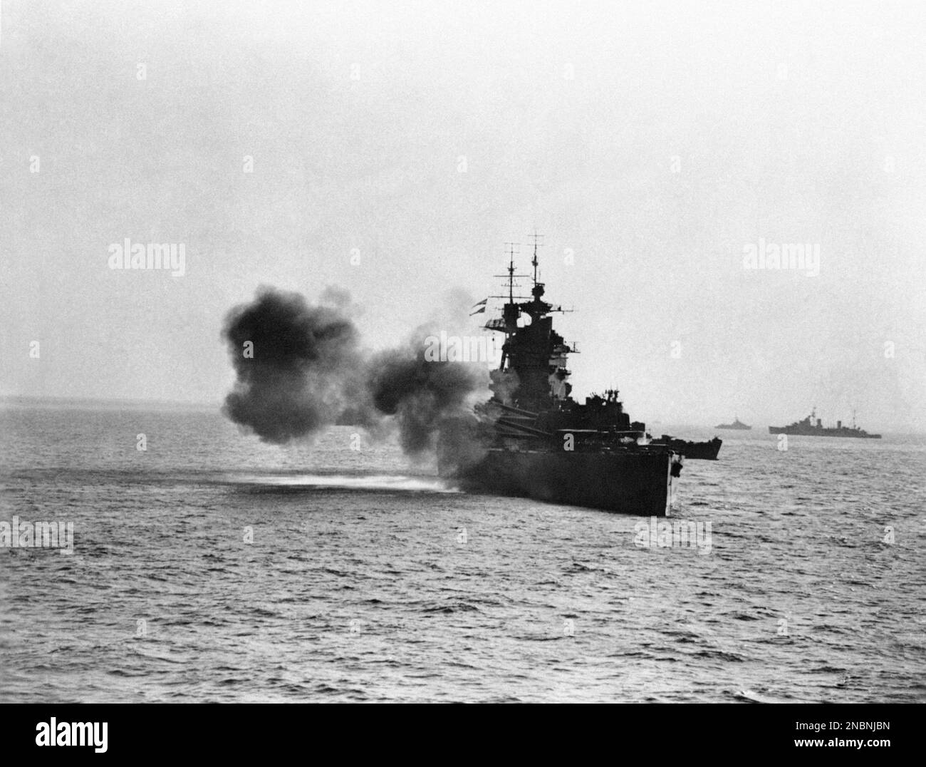 The British battleship Rodney bombarding enemy strong points on the ...