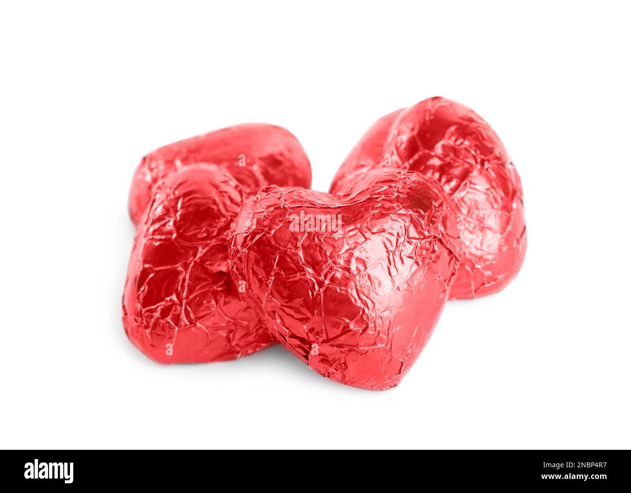 Heart shaped chocolate candies on white background Stock Photo Alamy