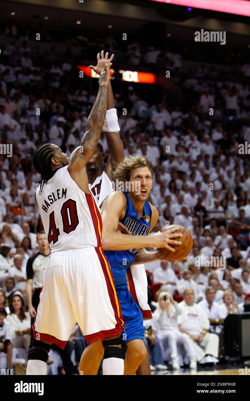 Dallas Mavericks Dirk Nowitzki Is Defended By Miami Heat S Udonis Haslem Left And Chris Bosh