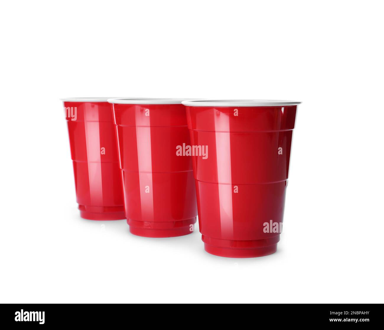 Red plastic cups on white background. Beer pong game Stock Photo Alamy