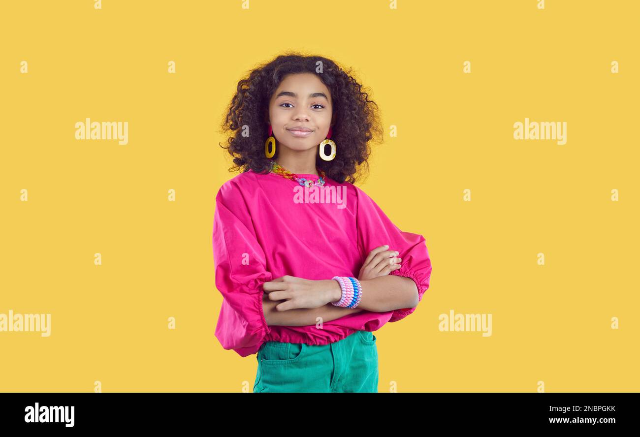 Studio portrait of happy beautiful African American child model in trendy clothes Stock Photo
