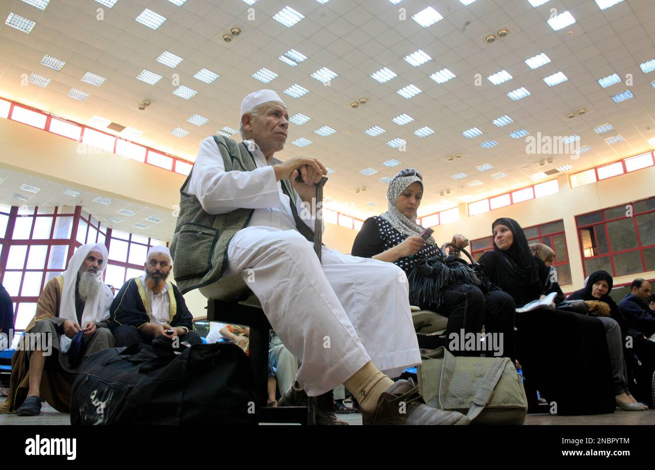 Palestinian Mohammed Zoarob, center, 75, who said he is traveling for