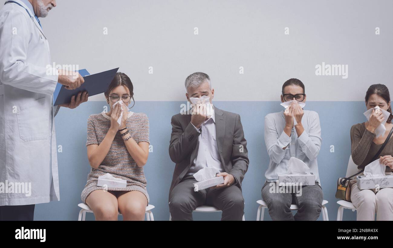 Sick people with cold and flu sitting in the waiting room at the hospital and blowing their