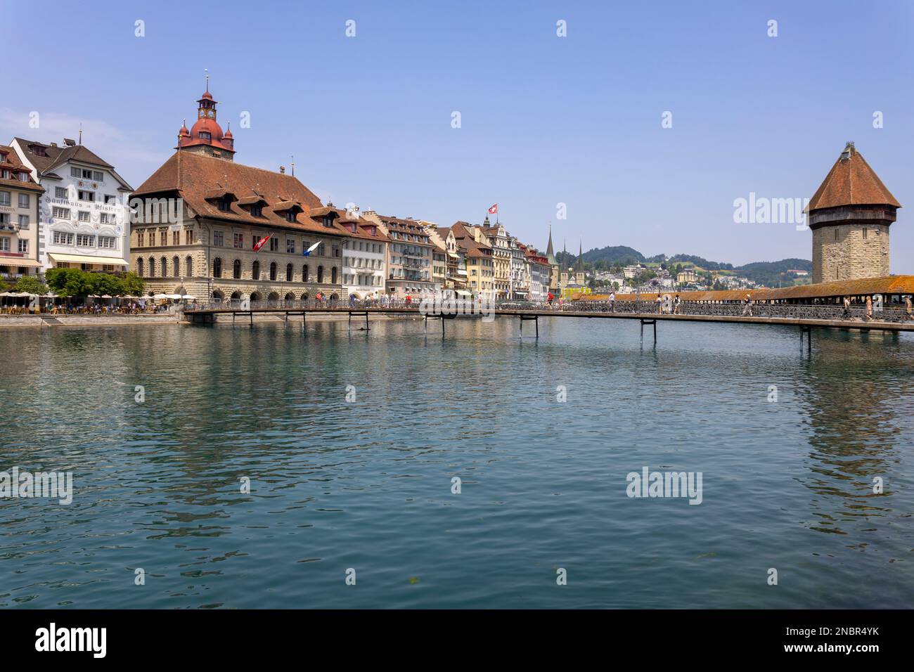 LUCERNE, SWITZERLAND, JUNE 21, 2022 - View of Rathaussteg bridge and the City Hall (Rathaus) in the center city of Lucerne, Switzerland Stock Photo
