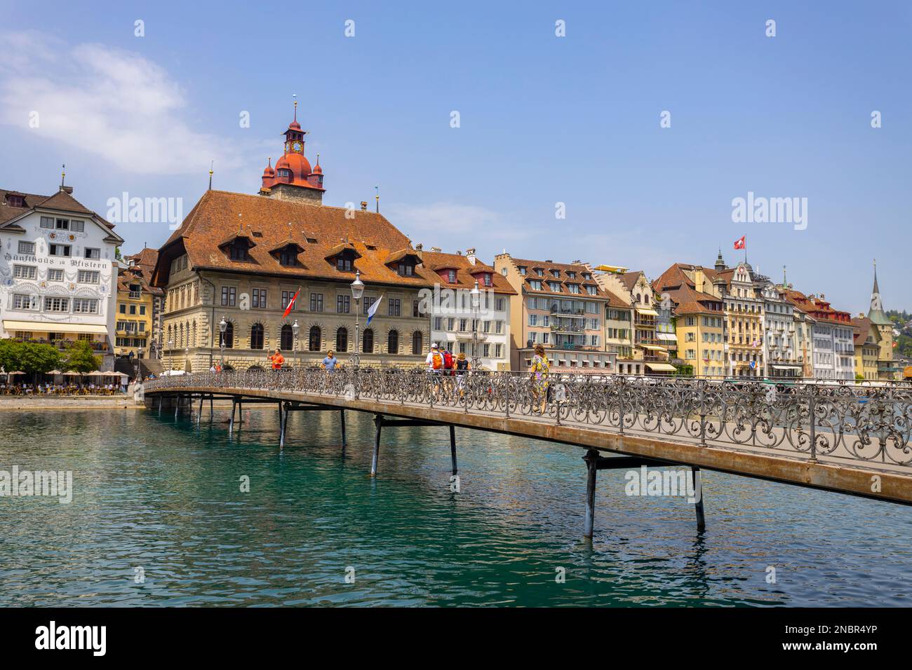 LUCERNE, SWITZERLAND, JUNE 21, 2022 - View of Rathaussteg bridge and the City Hall (Rathaus) in the center city of Lucerne, Switzerland Stock Photo