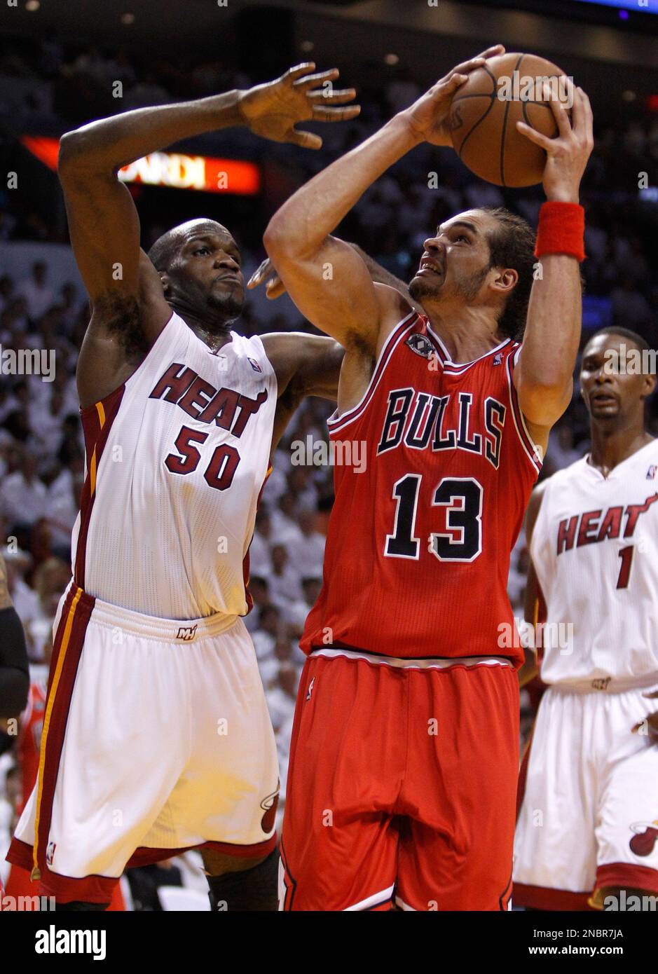 Chicago Bulls' Joakim Noah (13) prepares to shoot as Miami Heat's Joel