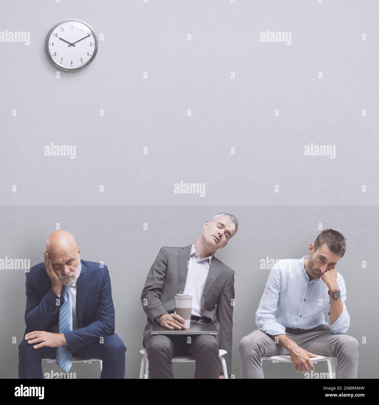 Corporate business people sitting and waiting for a meeting, they are tired and sleepy for the long wait Stock Photo