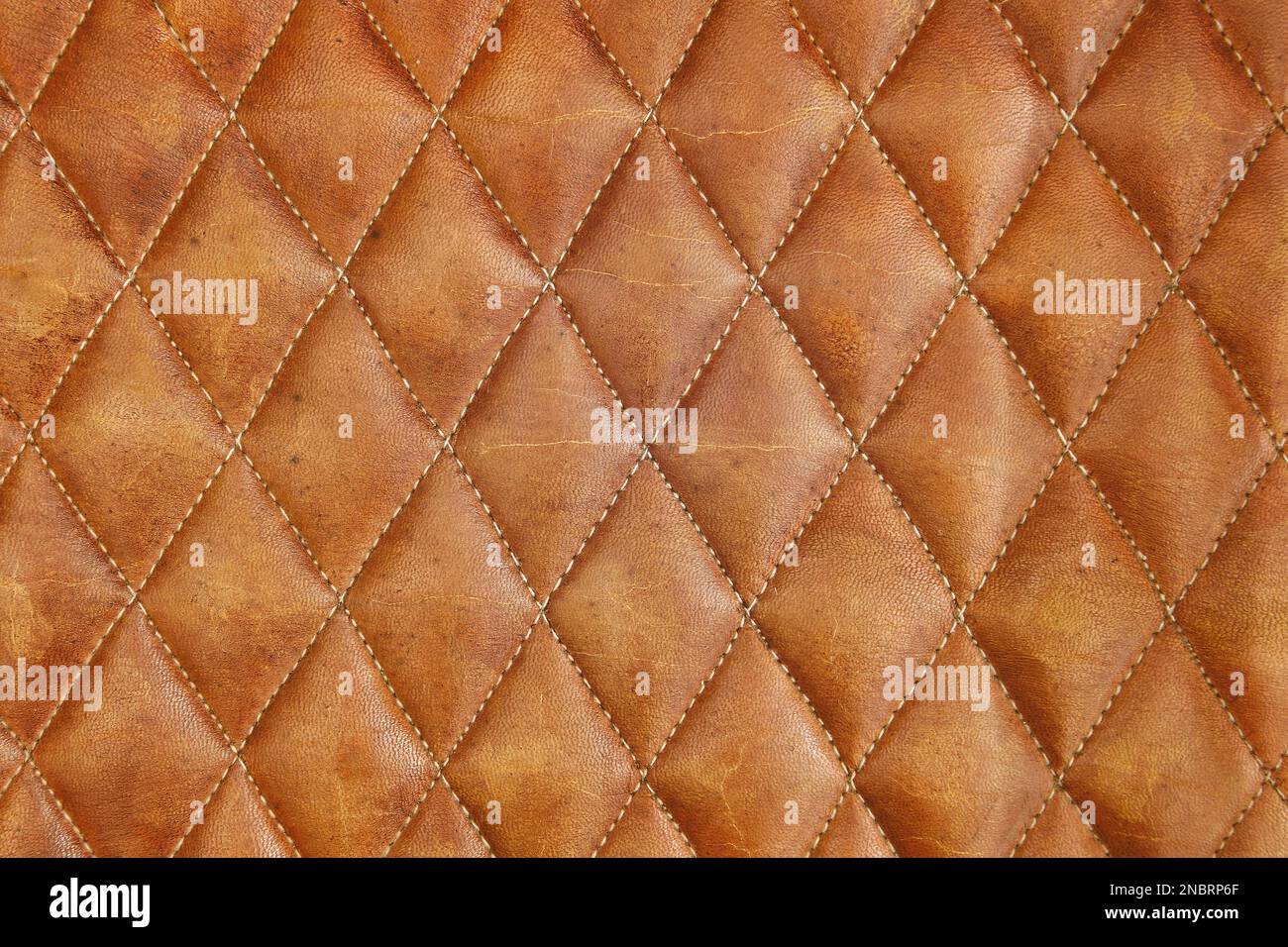 Leather brown sofa background with checkerboard pattern Stock Photo