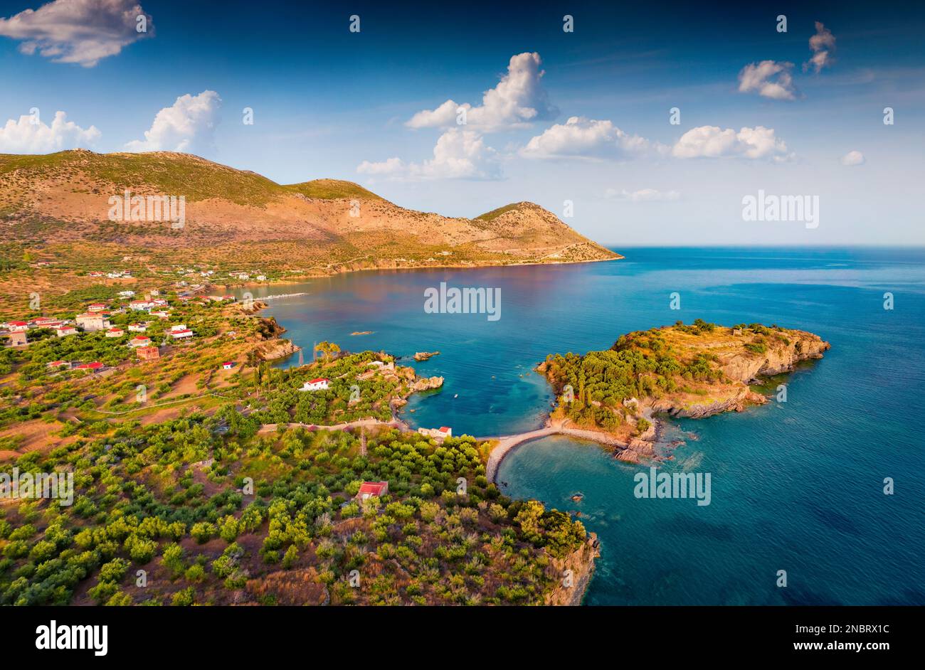 Wonderful summer view from flying drone of Purpose or Double beach, Kotronas town location. Amazing evening seascape of Mediterranean sea, Peloponnese Stock Photo