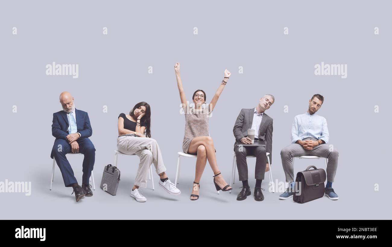 Happy woman celebrating with raised arms, the company recruited her ...