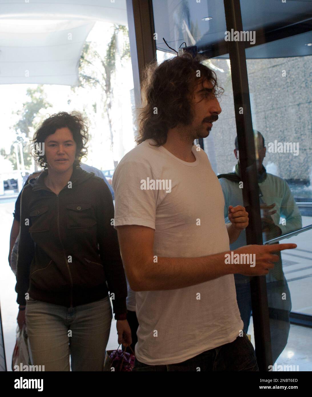 Freed American freelance journalist Clare Morgana Gillis, left and Spanish  photographer Manu Brabo arrive to a hotel where most of international media  stays in Tripoli, Libya, Wednesday, May 18, 2011. Four journalists