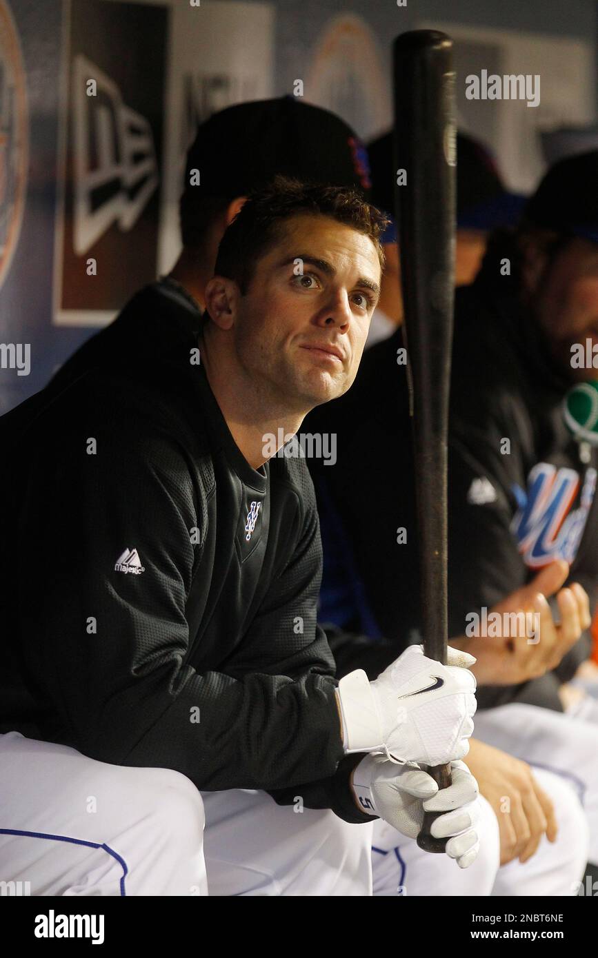 New York Mets' David Wright watches a baseball game against the