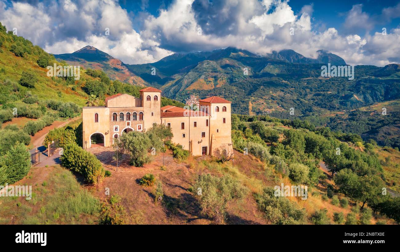 Gorgeous morning view from flying drone of typical Italian church, Bonifati village location, Province of Cosenza. Splendid summer scene of mountains Stock Photo