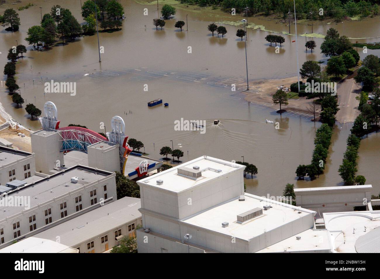Mississippi River flood waters are covering the parking lot of
